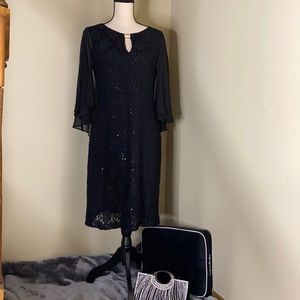 Black sequin dress by Connected Apparel.